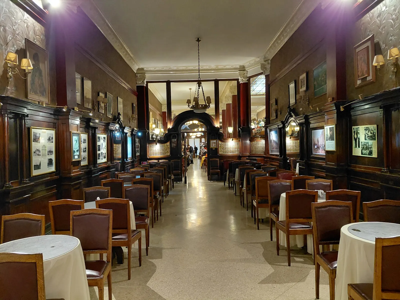 Marble tables and Tiffany glass ceiling inside Café Tortoni on Avenida de Mayo, Buenos Aires