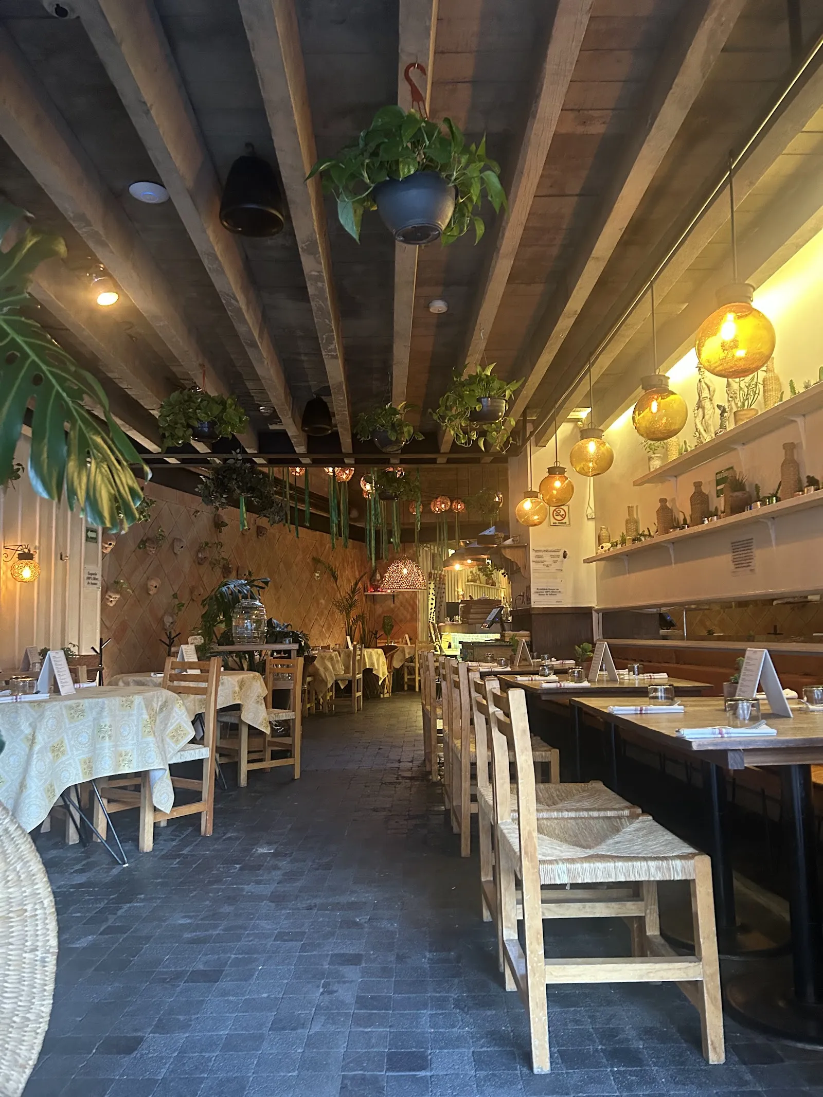 A weekday business lunch table set in a quiet Polanco dining room in Mexico City