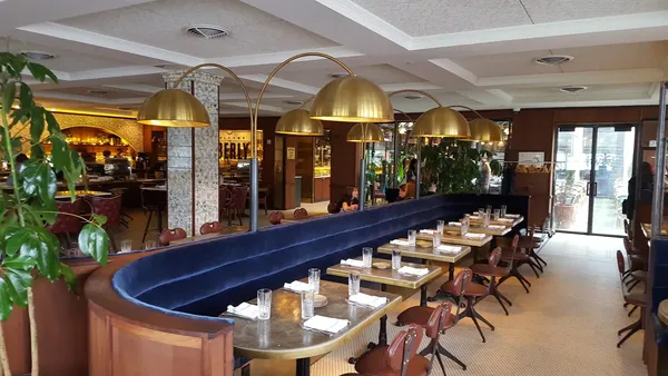 Eberly Austin Cedar Tavern Greenwich Village mahogany bar South Lamar warehouse interior