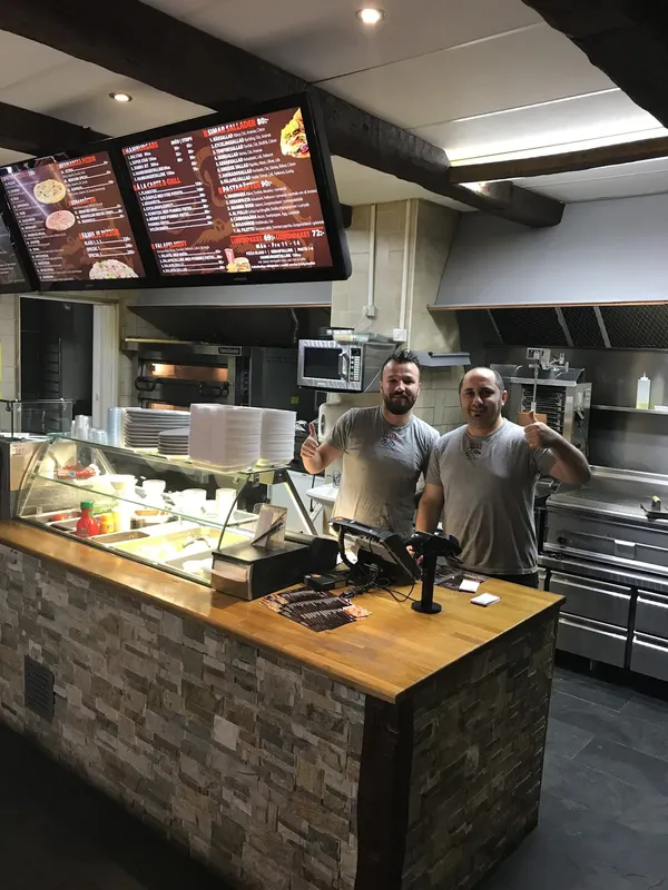 Brace Capri wood-fired Italian aged meats live fire cooking rustic confident dining
