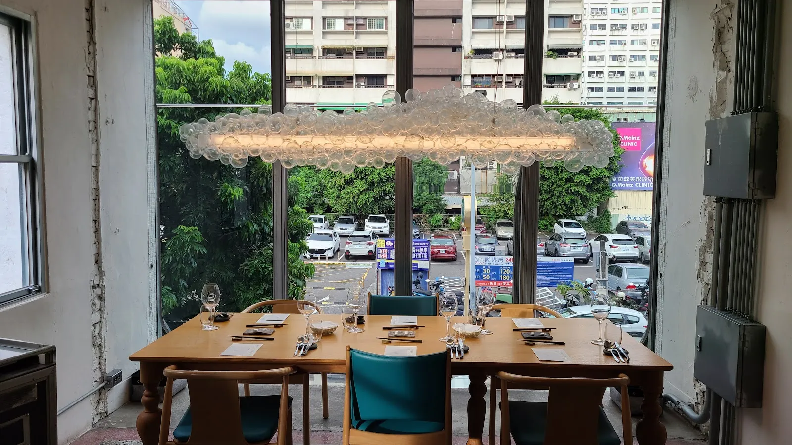 Glass-fronted townhouse dining counter at Marc L³, Renyi Street, Kaohsiung