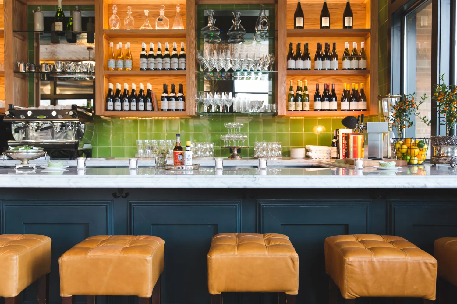 A Buckhead brunch table in Atlanta with a fried chicken biscuit and coffee