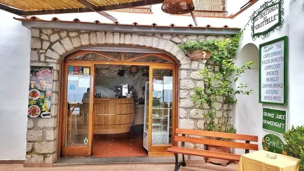 Le Grottelle Capri natural cave restaurant Mediterranean seafood specialist coastal views fine dining