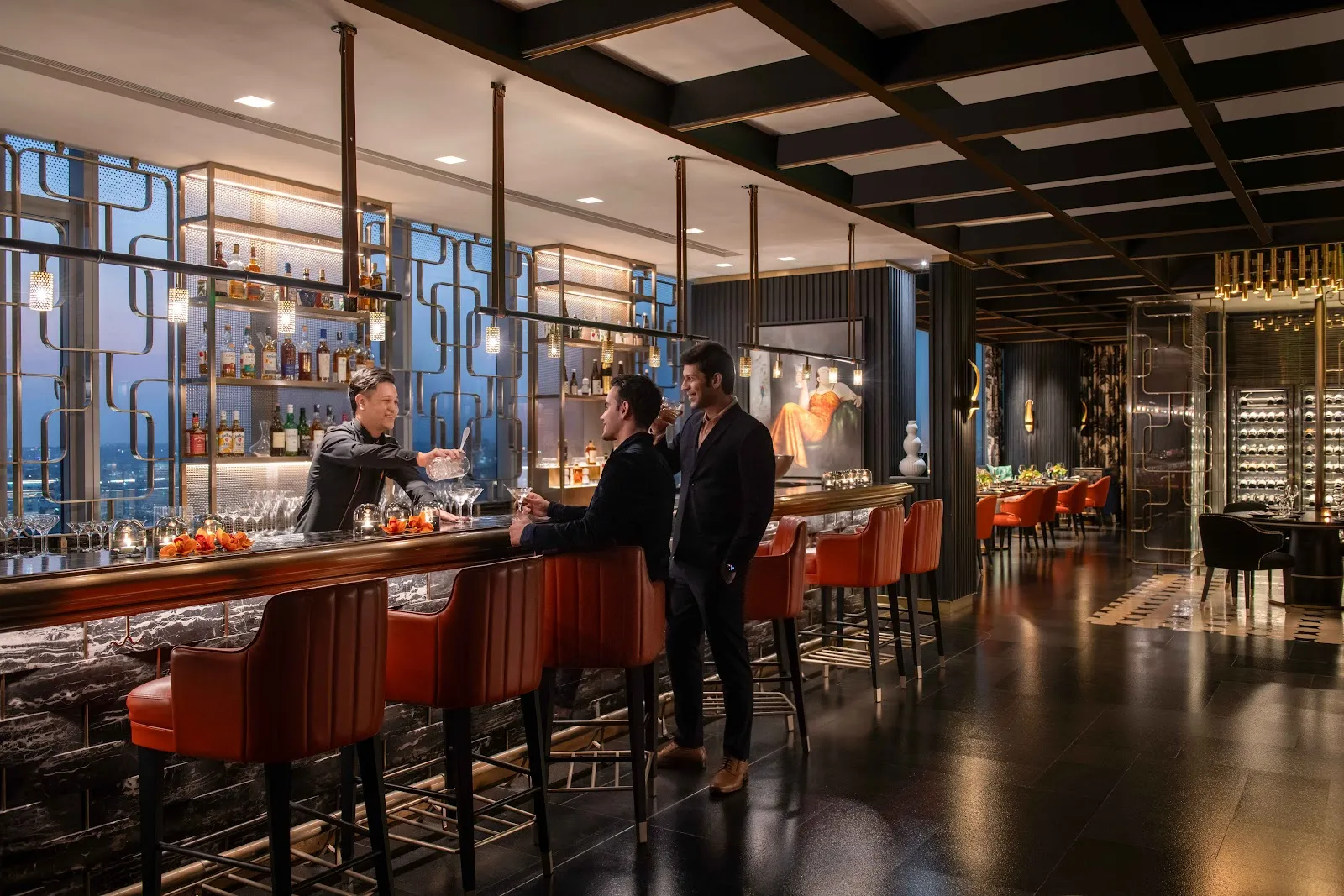 The 21st-floor Pan-Asian dining room with city views at Far & East, Four Seasons Bengaluru