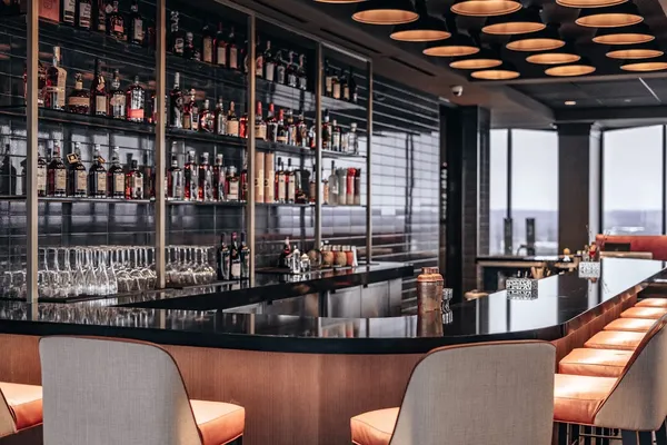 Swizzle Dinner Drinks Louisville rooftop bar revolving floors Ohio River view