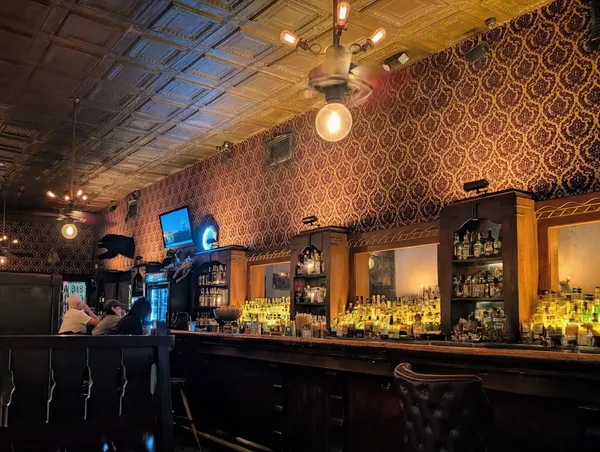 The Esquire Tavern San Antonio River Walk historic bar American food longest bar