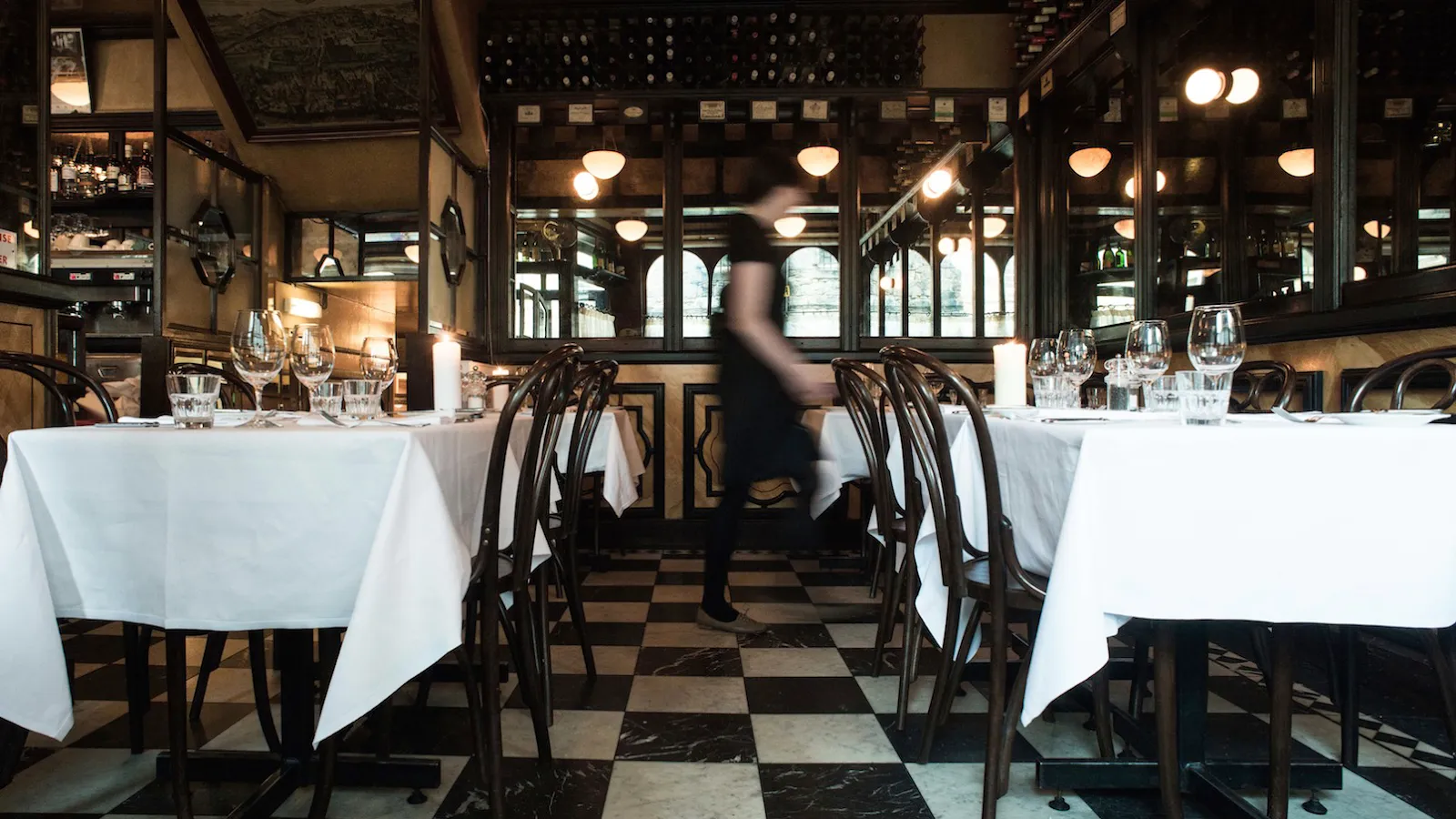 A candlelit corner table set for a first date in Edinburgh's New Town