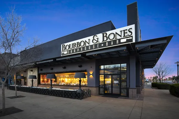 Bourbon and Bones Chophouse Gilbert Arizona steakhouse interior dark wood whiskey bar