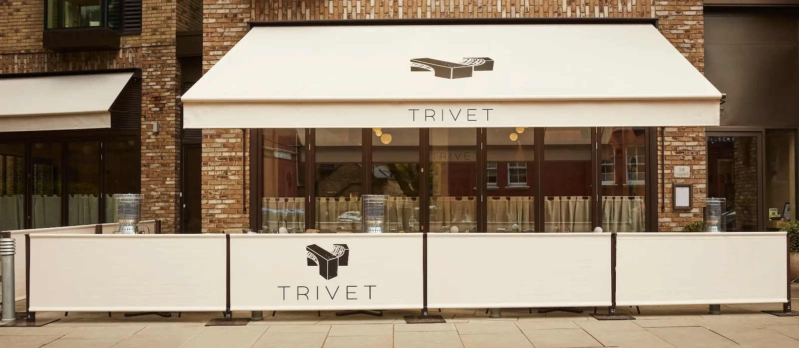 Dining room and open kitchen at Trivet, Bermondsey, London
