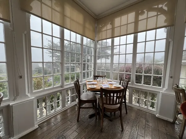 MacCallum House Restaurant Mendocino farm to table Victorian fireplace dining