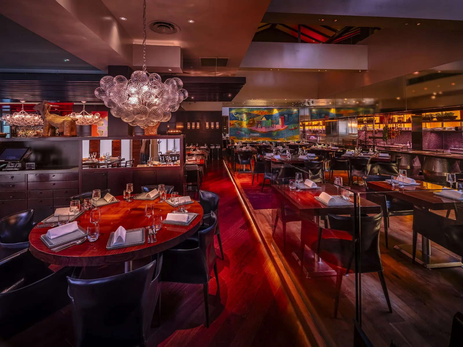 Open grill kitchen and dining room at Amaya, Belgravia, London