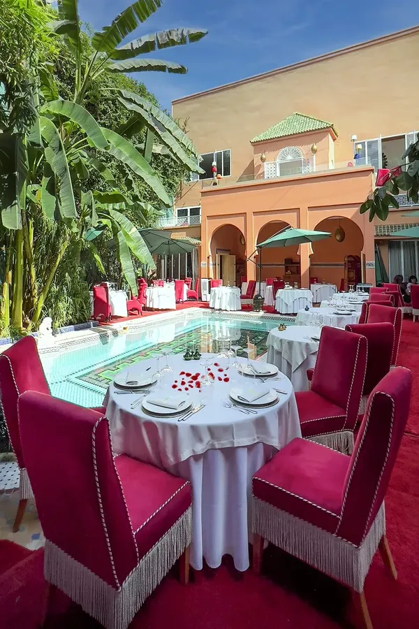 Poolside riad dining at Dar Moha, Mouassine medina Marrakech