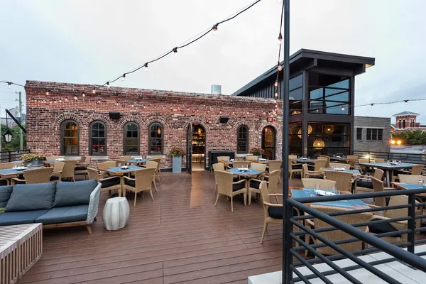 Livery Indianapolis Latin American rooftop restored 1890s stables